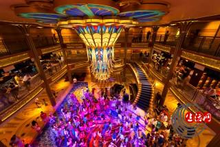Character dance party, in the lobby atrium on the new Disney Dream cruise ship sailing between Florida and the Bahamas.