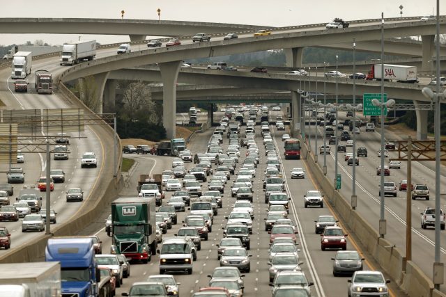 Automobiles get stacked up as they travel through Spaghetti Junction going northbound on I-85 Friday afternoon in Atlanta, Ga., March 29, 2013. The photograph was taken just north of Spaghetti Juntion on Northcrest Road. JASON GETZ / JGETZ@AJC.COM
